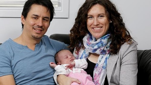 Sara Carrigan with husband Stevo Sing and their baby Bobbi.